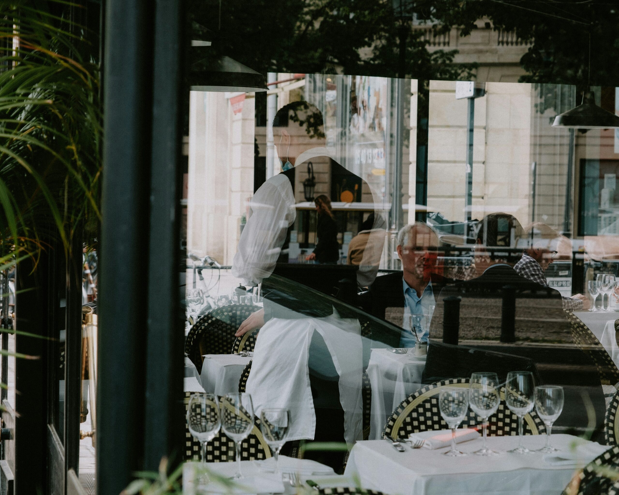 A model wearing Active Core Luxe outfit outside a café