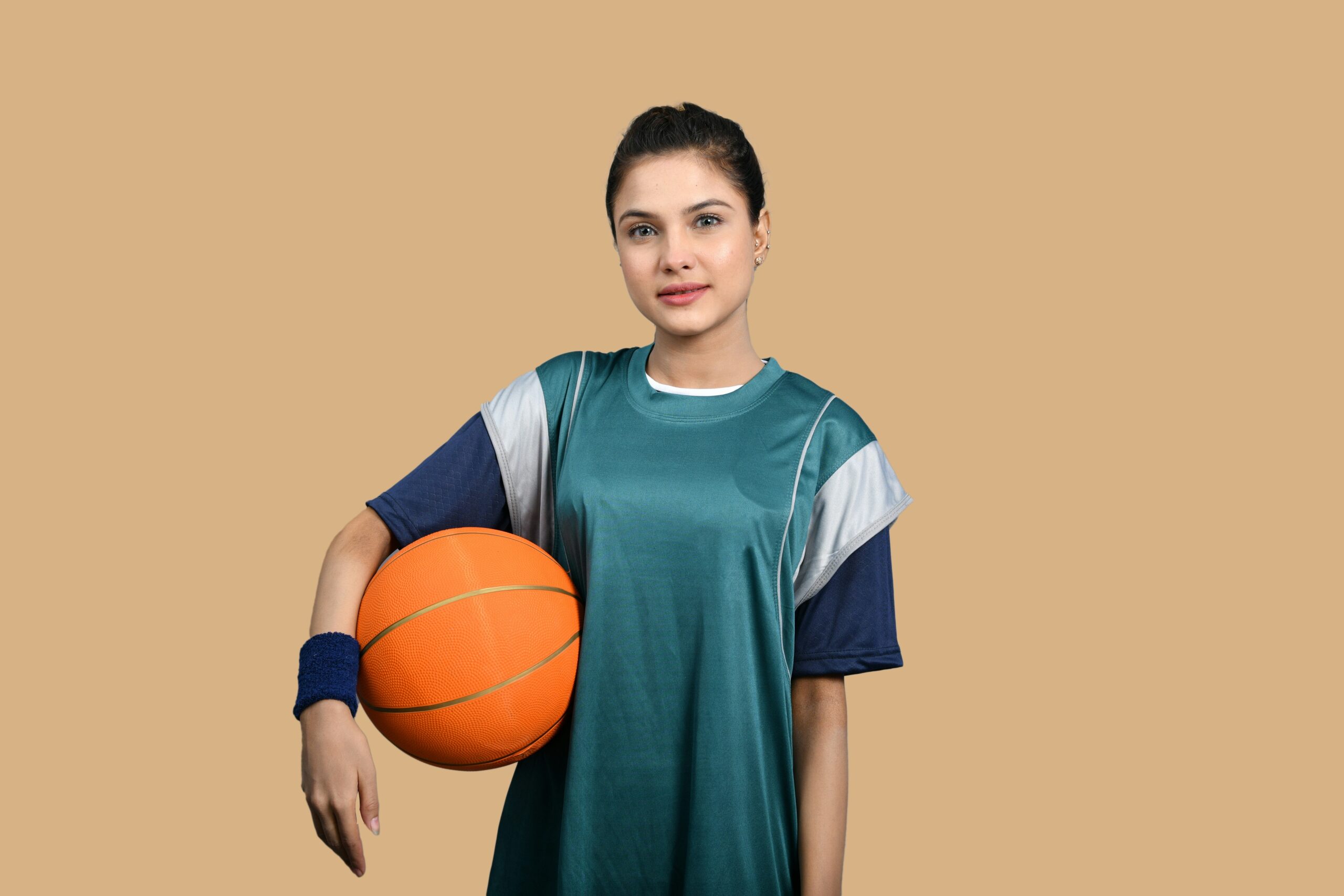 A woman wearing mismatched athletic wear looking puzzled