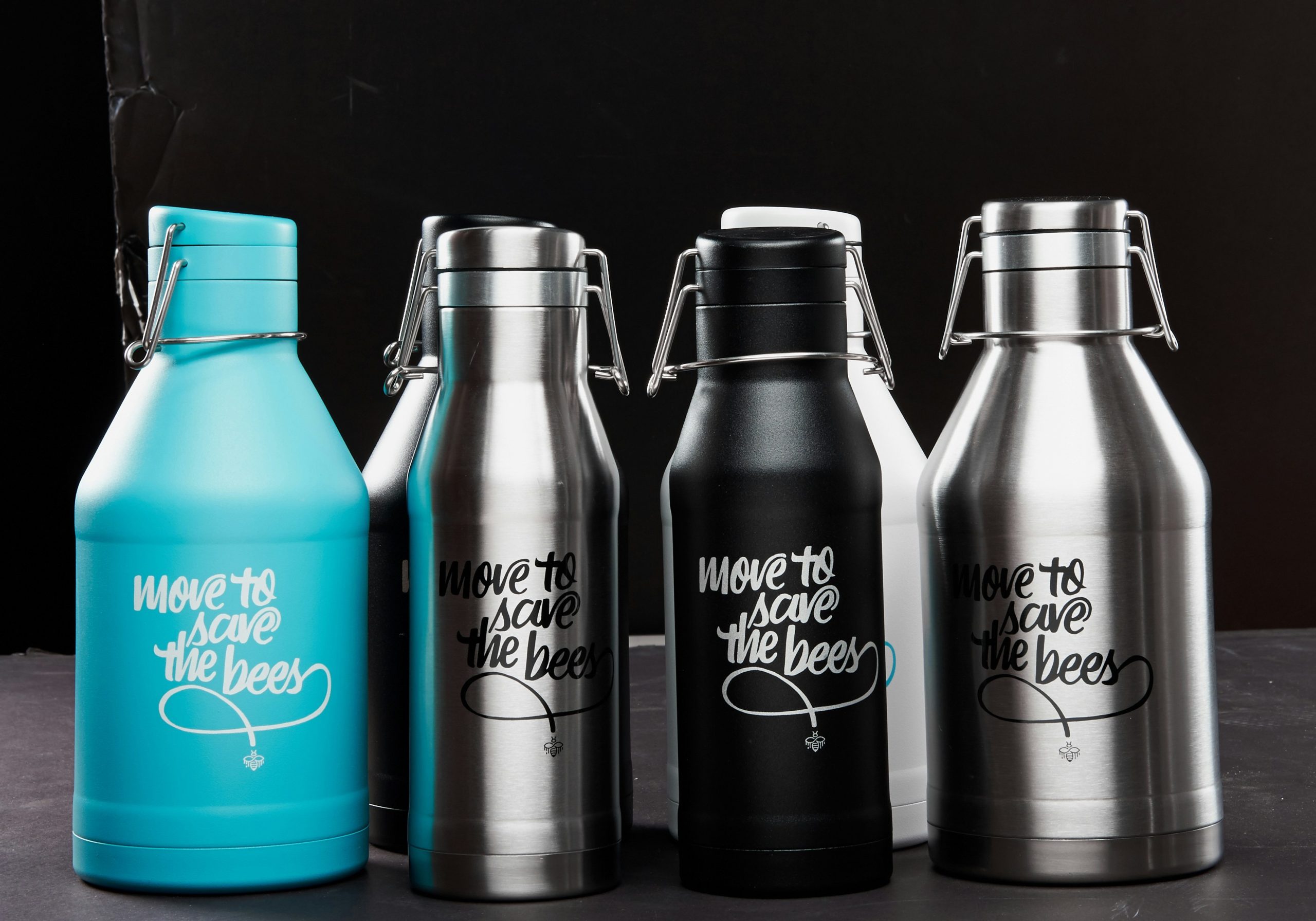 Sustainable handbags and water bottles displayed at Bloomingdale’s accessories section