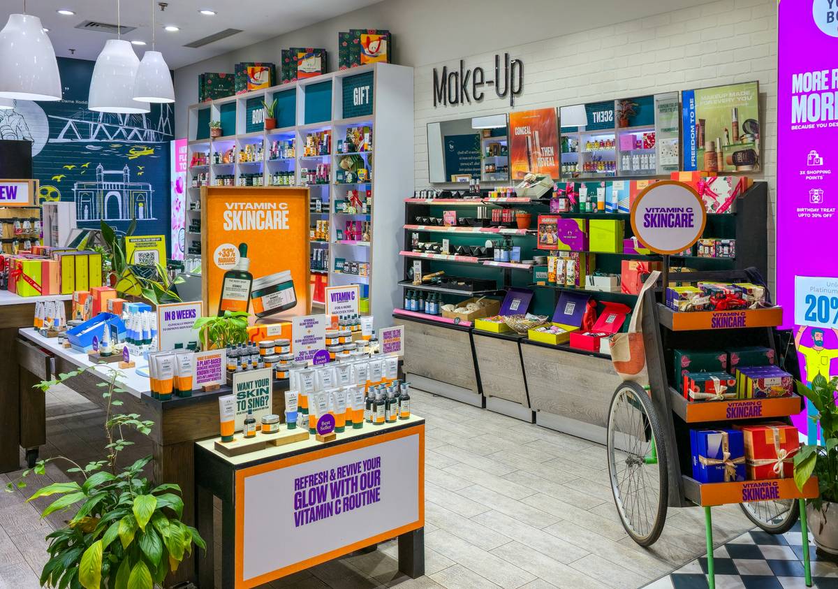 Person browsing online store on a laptop with Bloomingdale’s homepage visible