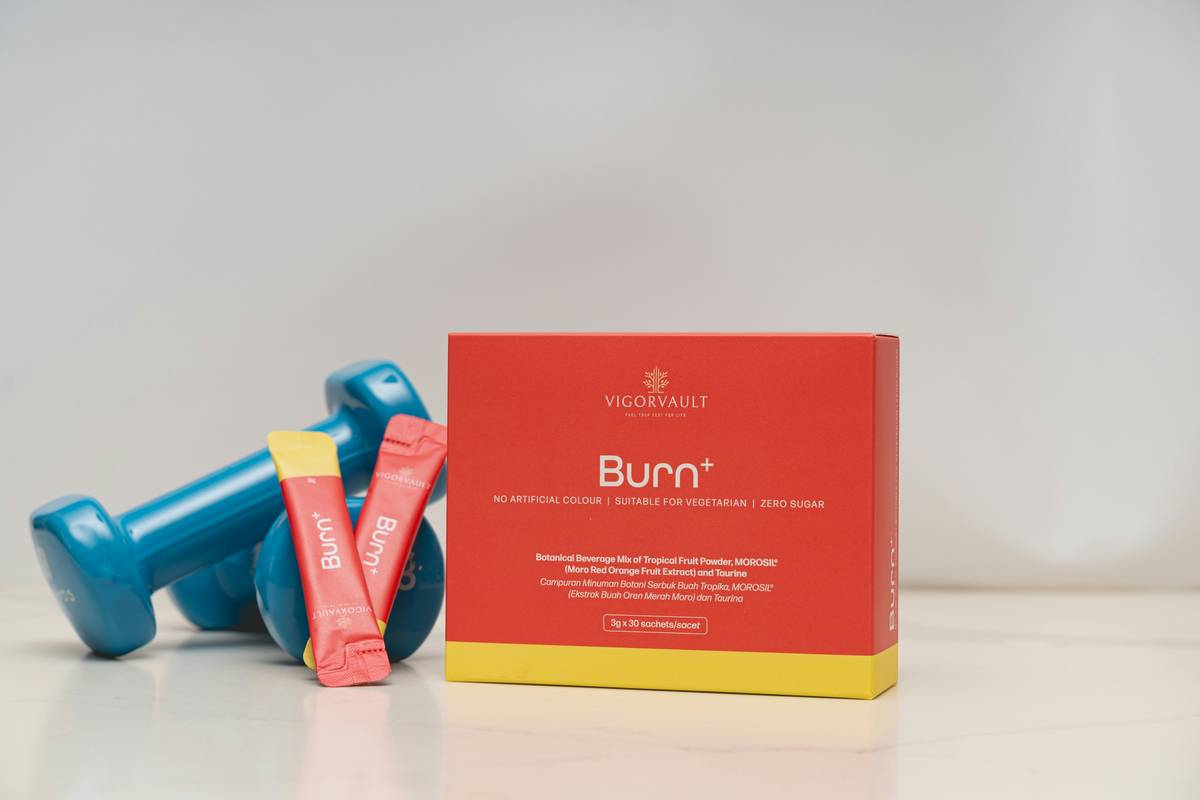 A sleek display of Bloomingdale’s active headbands, water bottles, and sports watches