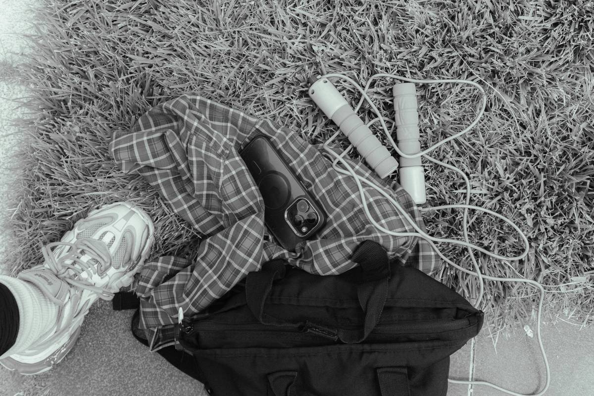 A model showcasing vibrant leggings and tank tops from Bloomingdale's athletic line.